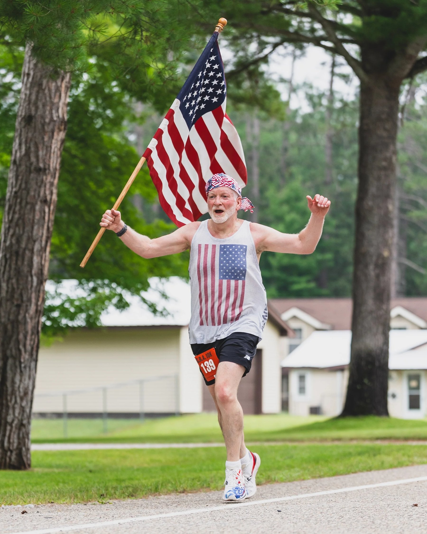 Hanson Hills runner with American flag